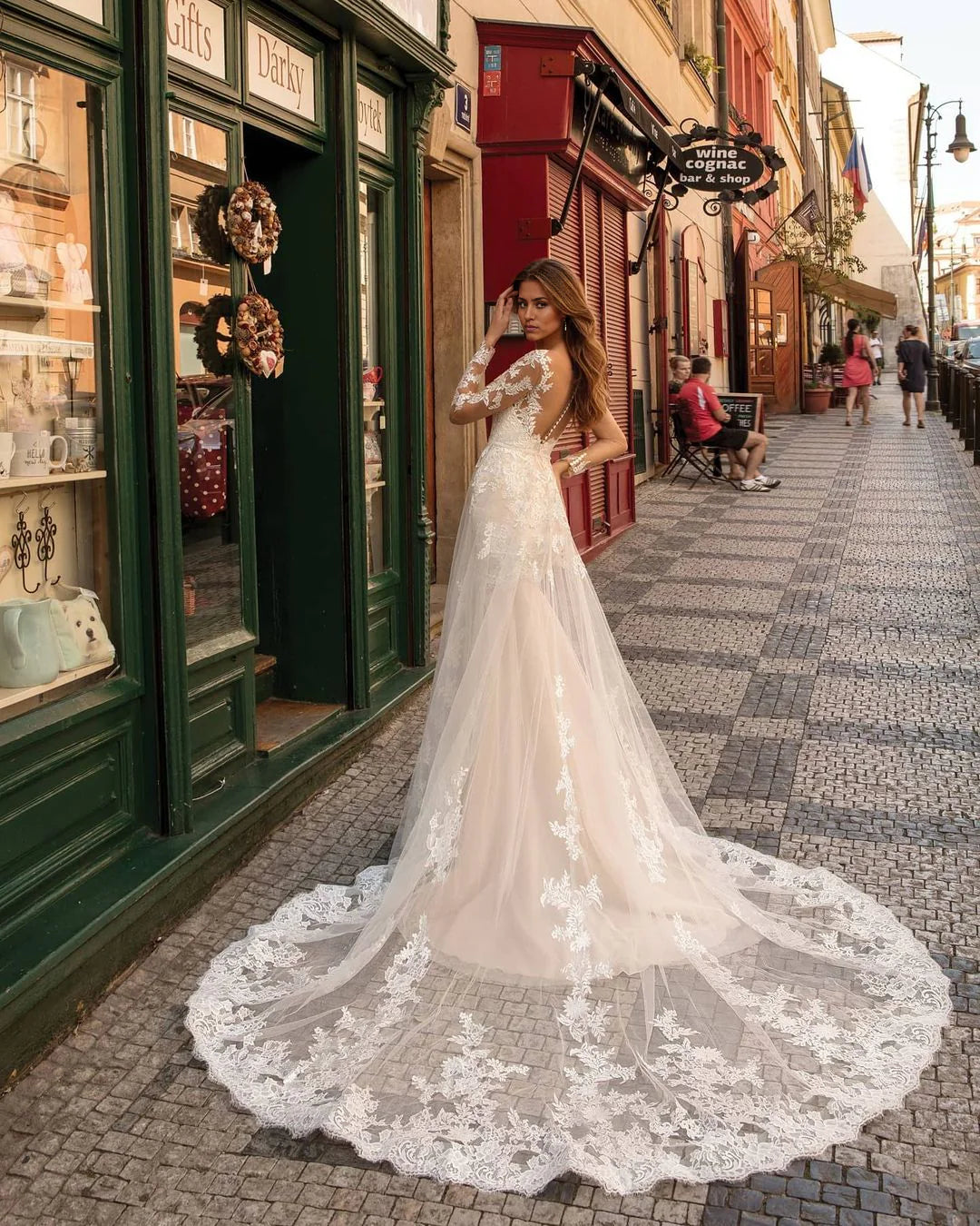 Vestidos de novia de encaje con mangas largas y corte sirena